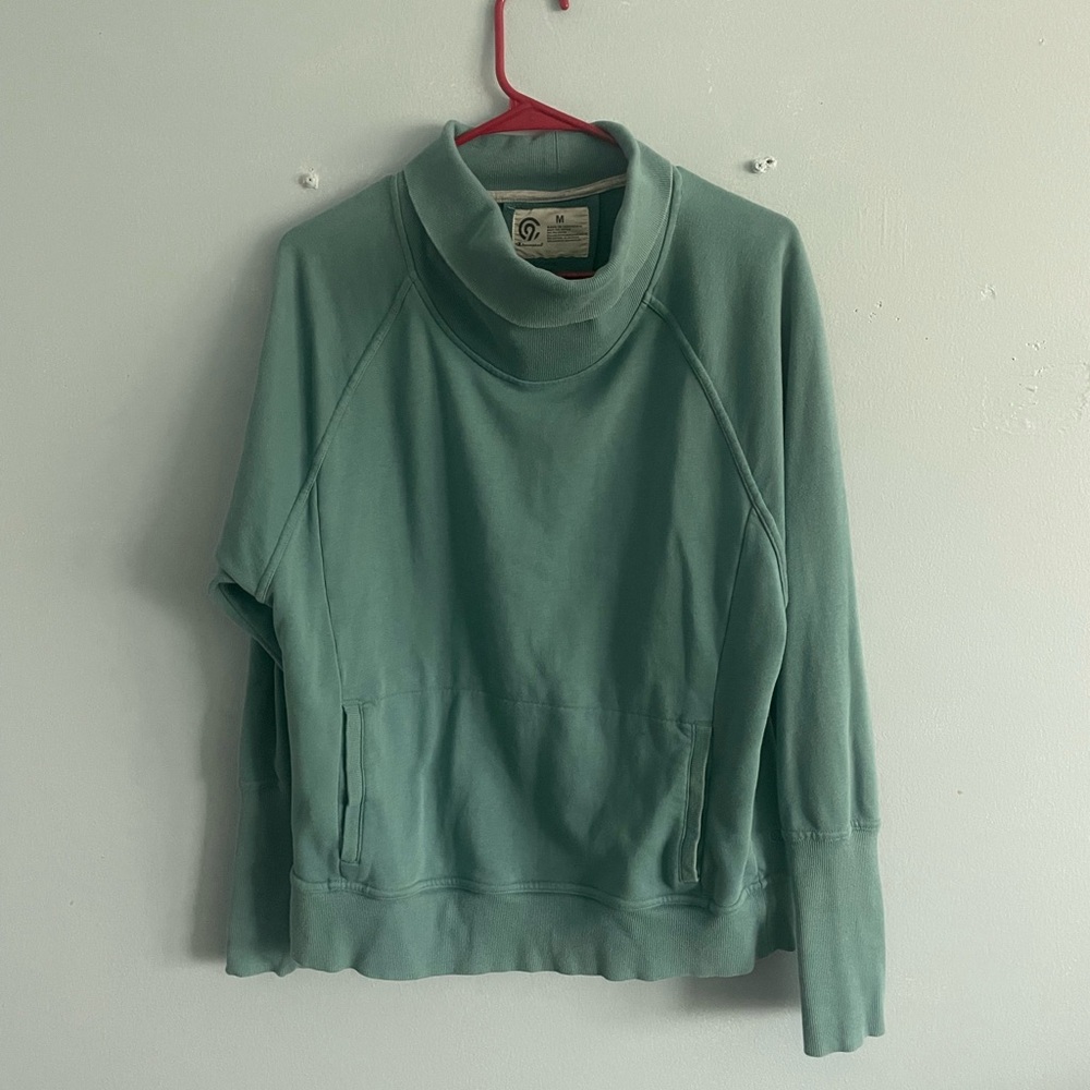 Champions teal top